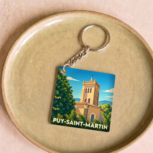 Porte-clés souvenir de la ville de Puy-Saint-Martin avec une illustration stylisée de son église.