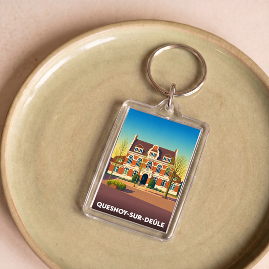 Porte-clés souvenir de Quesnoy-sur-Deûle présentant une illustration stylisée de son hôtel de ville.
