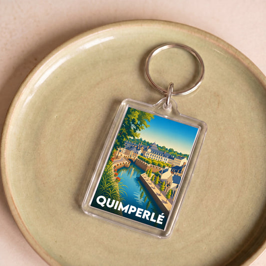 Porte-clés souvenir de la ville de Quimperlé avec une illustration stylisée.