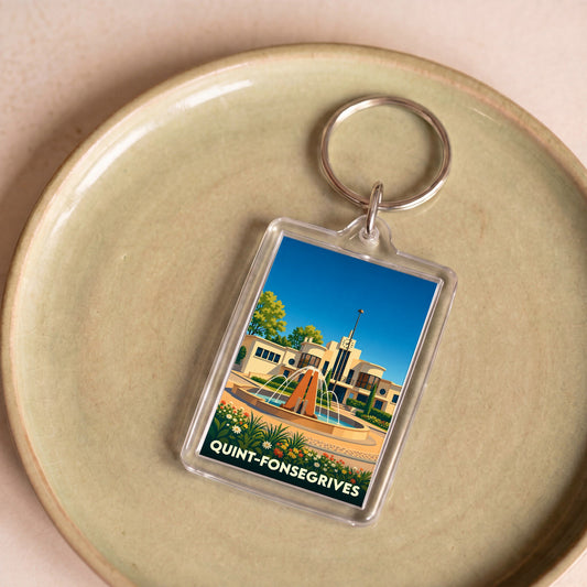 Porte-clés souvenir de la ville de Quint-Fonsegrives avec une illustration stylisée.