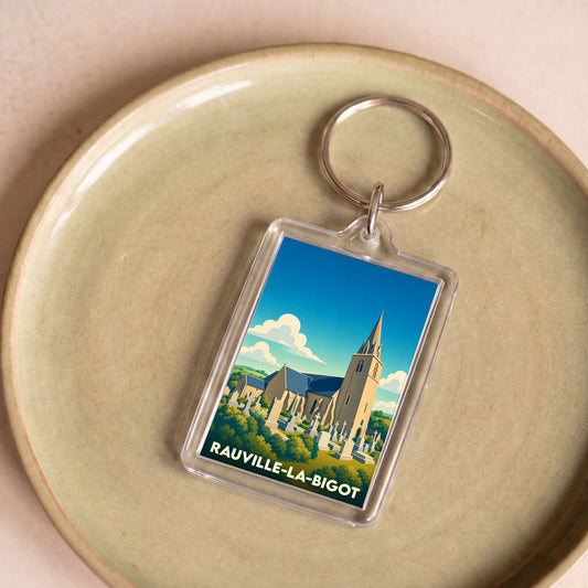 Porte-clés souvenir de la ville de Rauville-la-Bigot avec une illustration stylisée de son église.