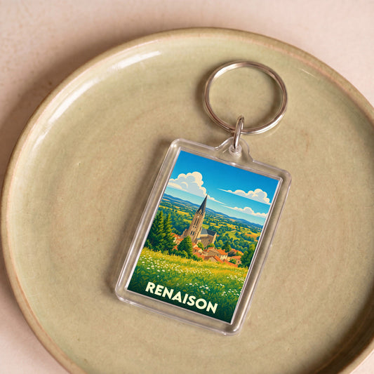Porte-clés souvenir de la ville de Renaison avec une illustration stylisée.