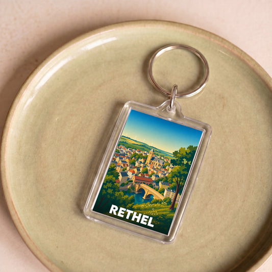 Porte-clés souvenir de la ville de Rethel avec une illustration stylisée.