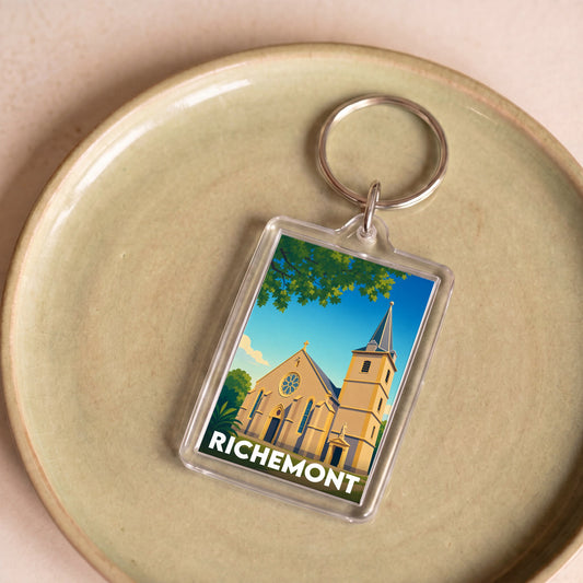 Porte-clés souvenir de la ville de Richemont avec une illustration stylisée.