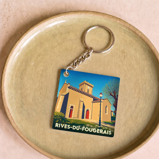 Porte-clés souvenir de la ville de Rives-du-Fougerais avec une illustration stylisée.