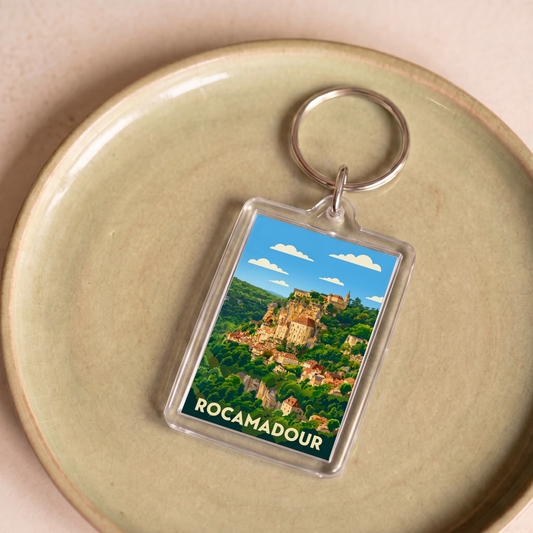 Porte-clés souvenir de la ville de Rocamadour avec une illustration stylisée.