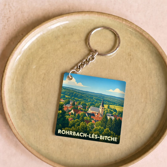 Porte-clés souvenir de la ville de Rohrbach-lès-Bitche avec une illustration stylisée.