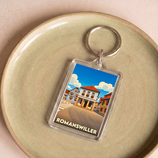 Porte-clés souvenir de la ville de Romanswiller avec une illustration stylisée.