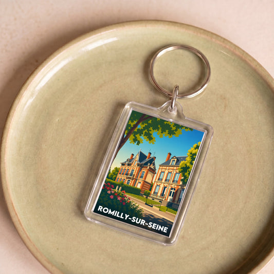 Porte-clés souvenir de la ville de Romilly-sur-Seine avec une illustration stylisée.
