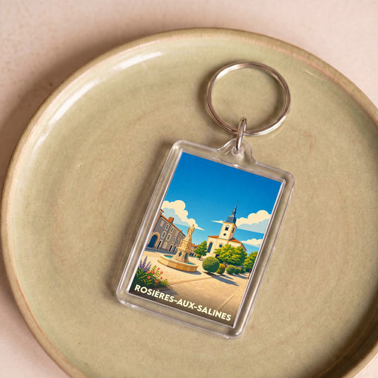 Porte-clés souvenir de la ville de Rosières-aux-Salines avec une illustration stylisée.