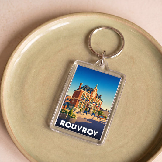 Porte-clés souvenir de la ville de Rouvroy orné d'une illustration stylisée de son hôtel de ville.