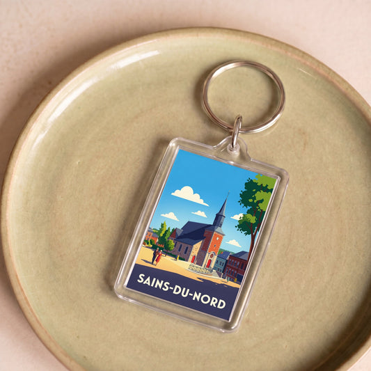 Porte-clés souvenir de la ville de Sains-du-Nord avec une illustration stylisée.