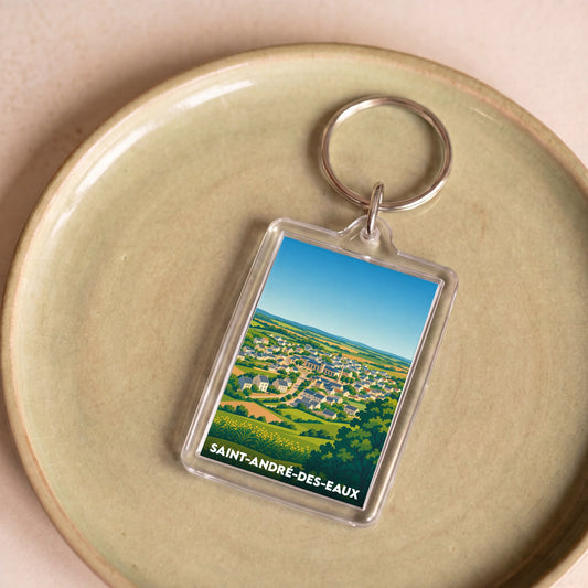 Porte-clés souvenir de la ville de Saint-André-des-Eaux avec une illustration stylisée.