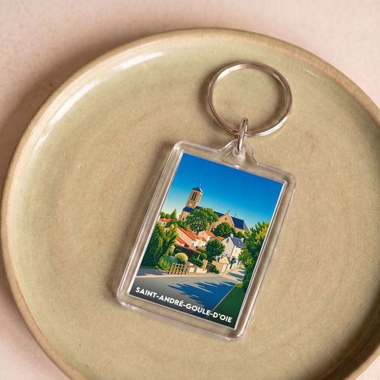 Porte-clés souvenir de la ville de Saint-André-Goule-d'Oie avec une illustration stylisée.