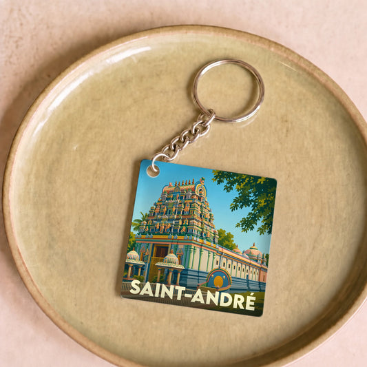 Porte-clés souvenir de la ville de Saint-André avec une illustration stylisée d'un temple tamoul.