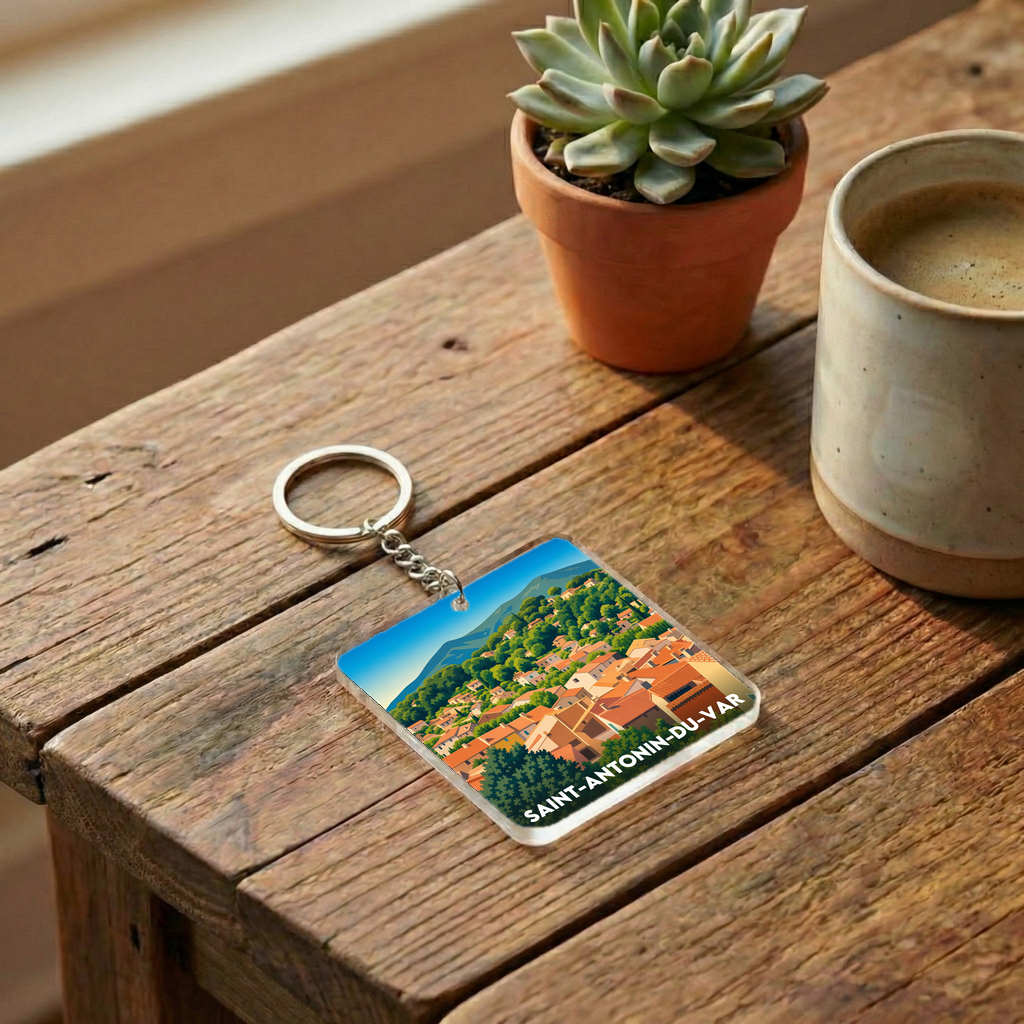 Porte-clés souvenir de la ville de Saint-Antonin-du-Var avec une illustration stylisée.