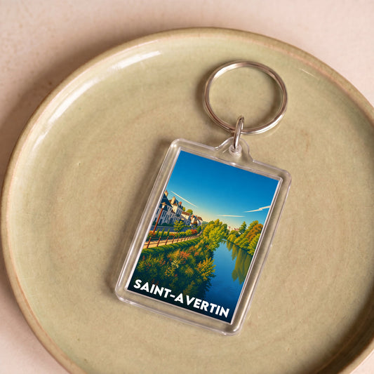 Porte-clés souvenir de la ville de Saint-Avertin avec une illustration de paysage stylisée.