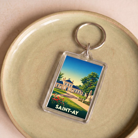 Porte-clés souvenir de la ville de Saint-Ay avec une illustration stylisée de son patrimoine.