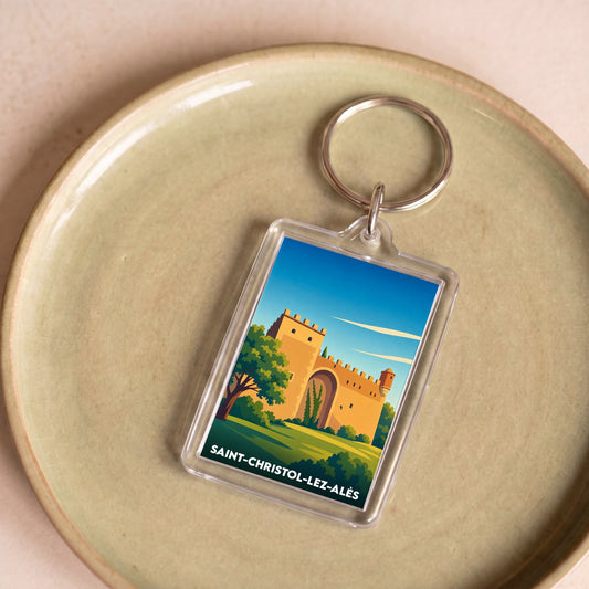 Porte-clés souvenir de la ville de Saint-Christol-lez-Alès avec une illustration stylisée.