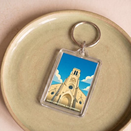 Porte-clés souvenir de la ville de Saint-Christophe-du-Ligneron avec une illustration stylisée de son église.