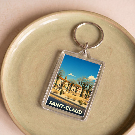 Porte-clés souvenir de la ville de Saint-Claud avec une illustration stylisée.