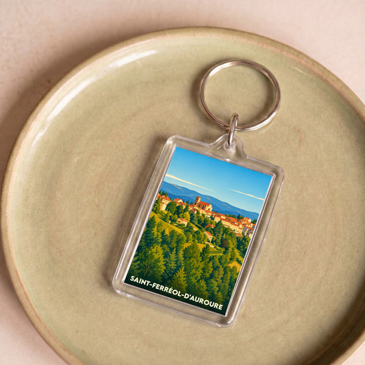 Porte-clés souvenir de la ville de Saint-Ferréol-d'Auroure avec une illustration stylisée.