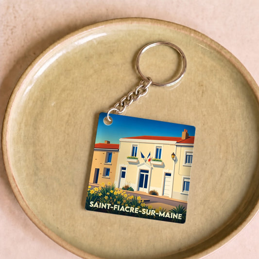 Porte-clés souvenir de la ville de Saint-Fiacre-sur-Maine avec une illustration stylisée.
