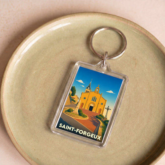 Porte-clés souvenir de la ville de Saint-Forgeux avec une illustration stylisée de son église.