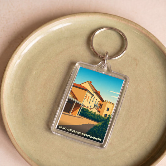 Porte-clés souvenir de la ville de Saint-Georges-d'Espéranche avec une illustration stylisée.