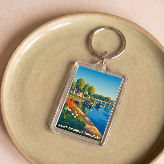 Porte-clés souvenir de la ville de Saint-Georges-sur-Loire avec une illustration stylisée.