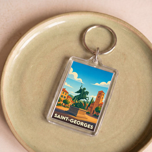 Porte-clés souvenir de la ville de Saint-Georges avec une illustration stylisée.