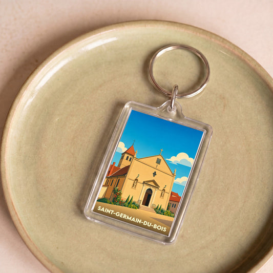 Porte-clés souvenir de la ville de Saint-Germain-du-Bois avec une illustration stylisée de son église.