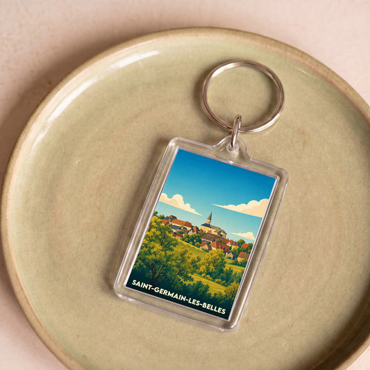 Porte-clés souvenir de la ville de Saint-Germain-les-Belles avec une illustration stylisée.