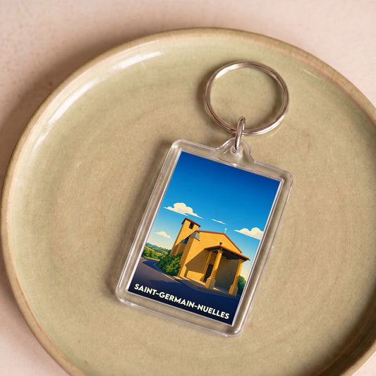 Porte-clés souvenir de la ville de Saint-Germain-Nuelles avec une illustration stylisée de son patrimoine.