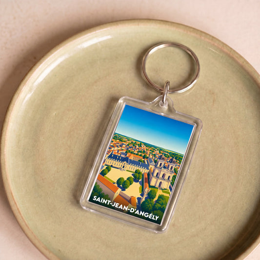 Porte-clés souvenir de la ville de Saint-Jean-d'Angély avec une illustration stylisée.