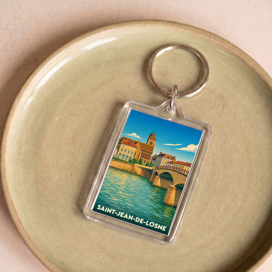 Porte-clés souvenir de la ville de Saint-Jean-de-Losne avec une illustration stylisée.