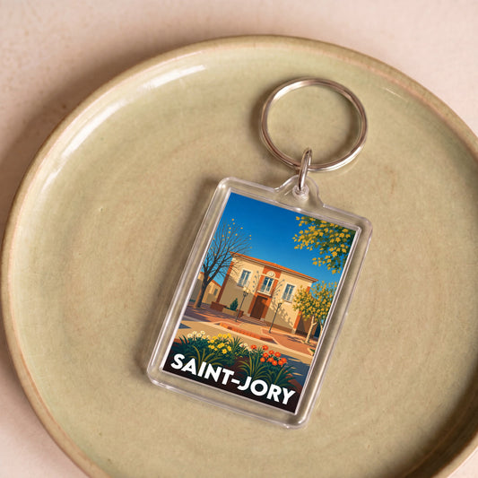 Porte-clés souvenir de la ville de Saint-Jory avec une illustration stylisée.