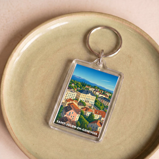 Porte-clés souvenir de la ville de Saint-Julien-en-Genevois avec une illustration stylisée.