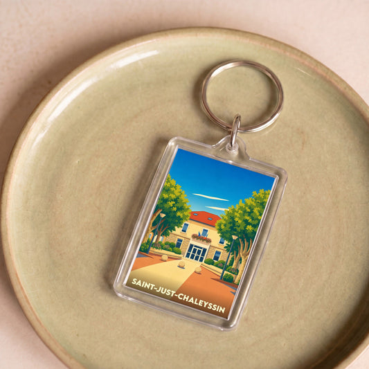 Porte-clés souvenir de la ville de Saint-Just-Chaleyssin avec une illustration stylisée.