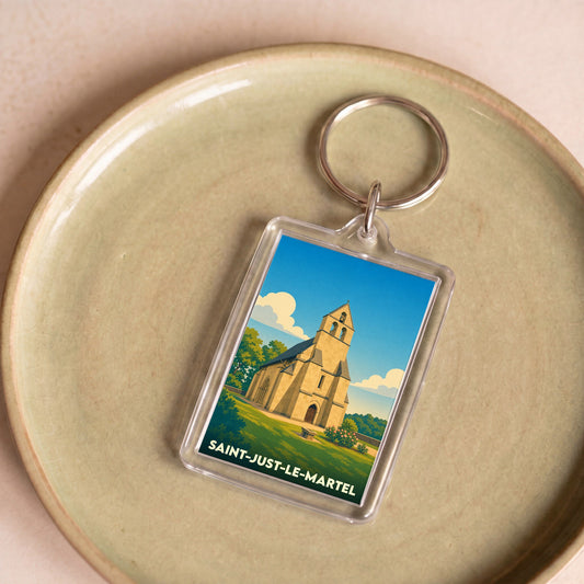 Porte-clés souvenir de la ville de Saint-Just-le-Martel avec une illustration stylisée de son église.