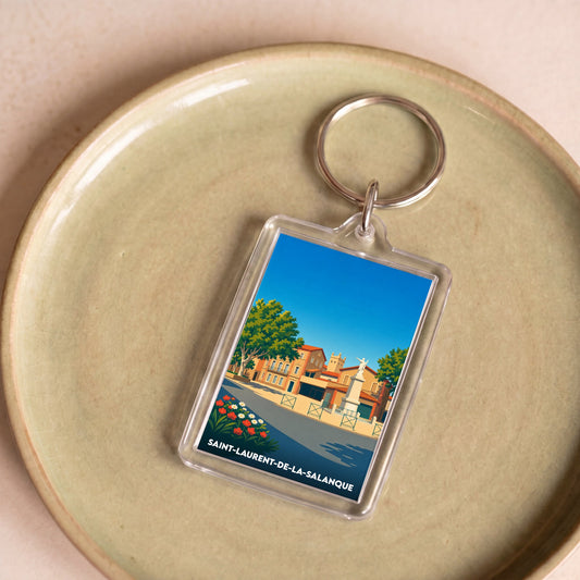 Porte-clés souvenir de la ville de Saint-Laurent-de-la-Salanque avec une illustration stylisée.