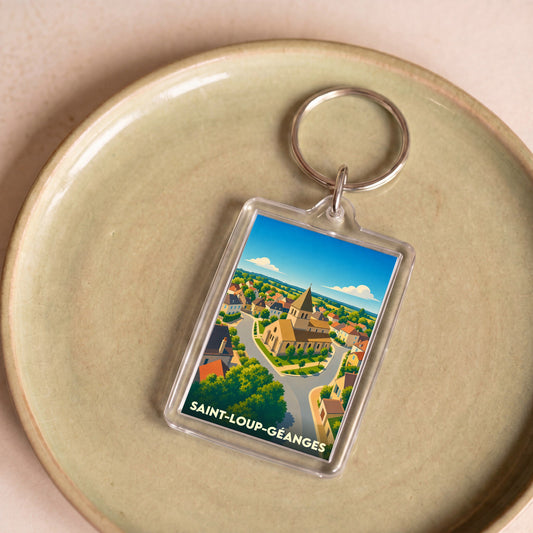Porte-clés souvenir de la ville de Saint-Loup-Géanges avec une illustration stylisée.