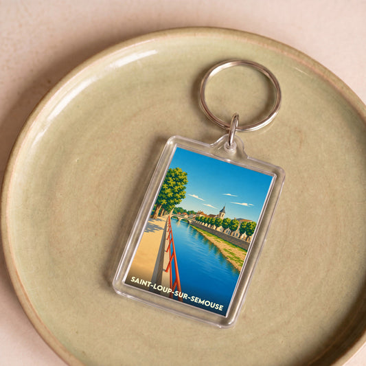 Porte-clés souvenir de la ville de Saint-Loup-sur-Semouse avec une illustration stylisée des bords de la Semouse.