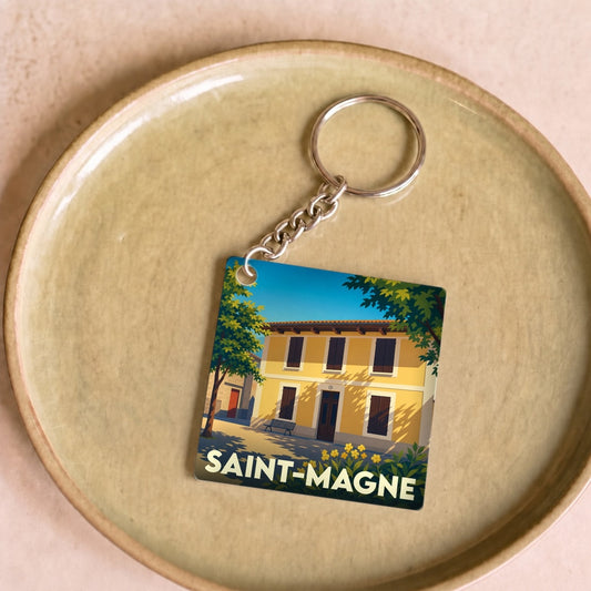 Porte-clés souvenir de la ville de Saint-Magne avec une illustration stylisée.