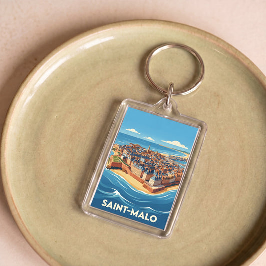 Porte-clés souvenir de la ville de Saint-Malo avec une illustration stylisée.