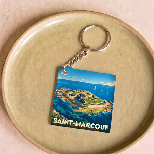 Porte-clés souvenir de la ville de Saint-Marcouf avec une illustration stylisée.
