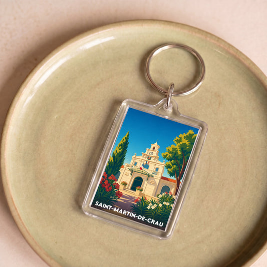 Porte-clés souvenir de la ville de Saint-Martin-de-Crau avec une illustration stylisée.
