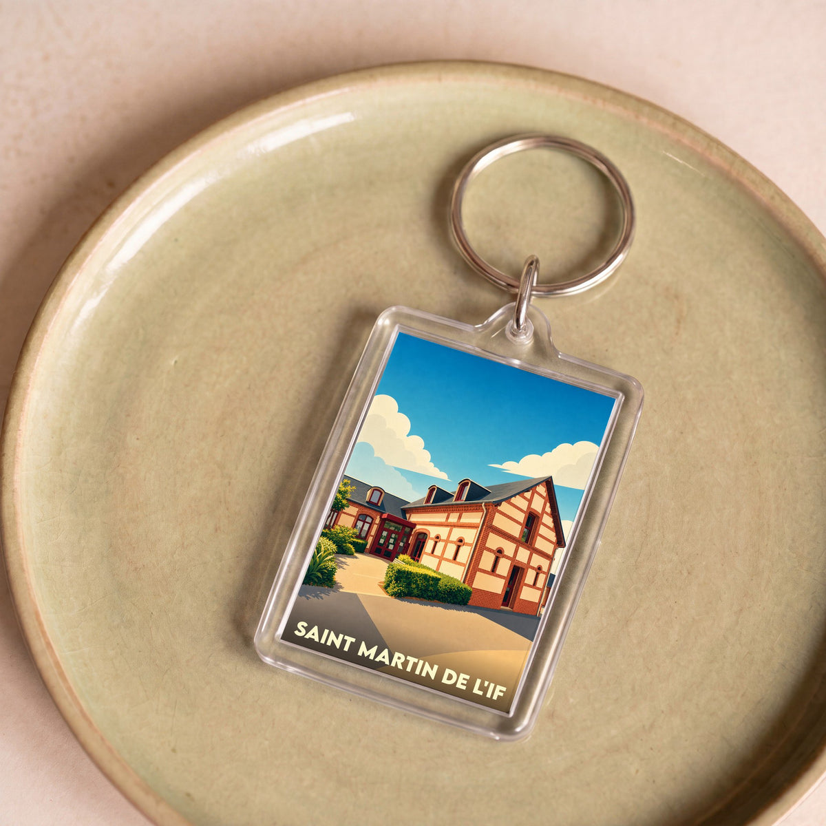 Porte-clés souvenir de la commune de Saint Martin de l'If avec une illustration stylisée.