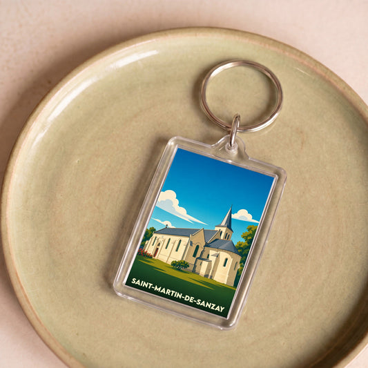 Porte-clés souvenir de la ville de Saint-Martin-de-Sanzay avec une illustration stylisée de son église.