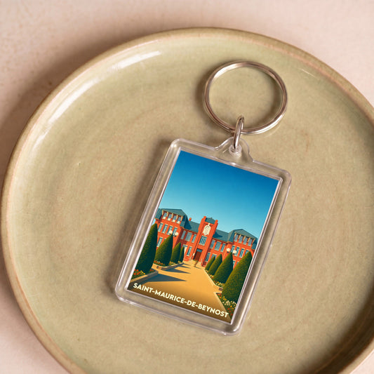 Porte-clés souvenir de la ville de Saint-Maurice-de-Beynost avec une illustration stylisée de sa mairie.